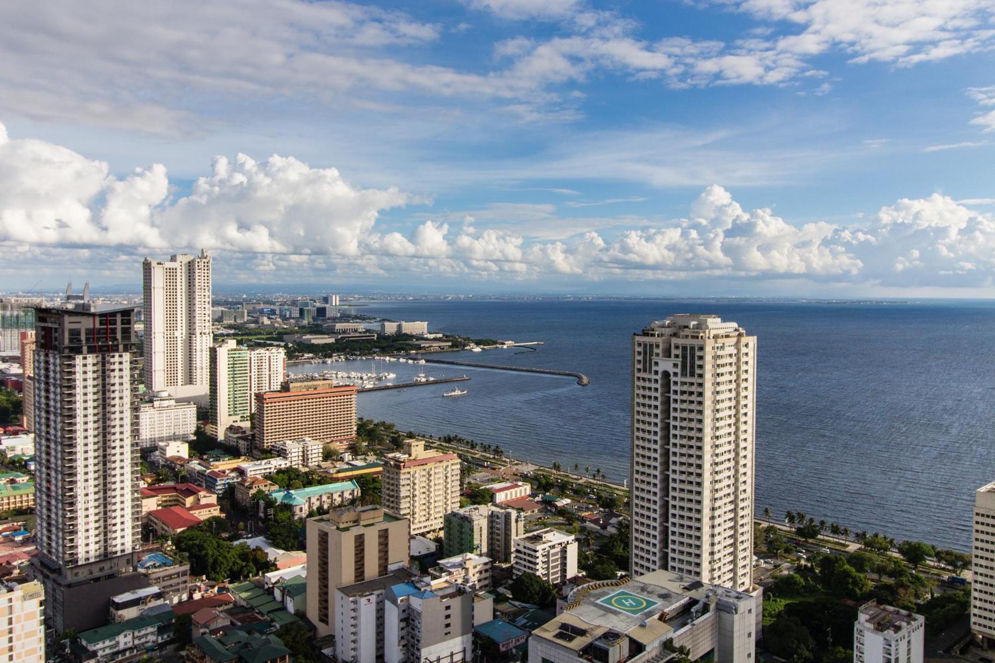 Pacific Bay Grand Suites Manila Exteriör bild