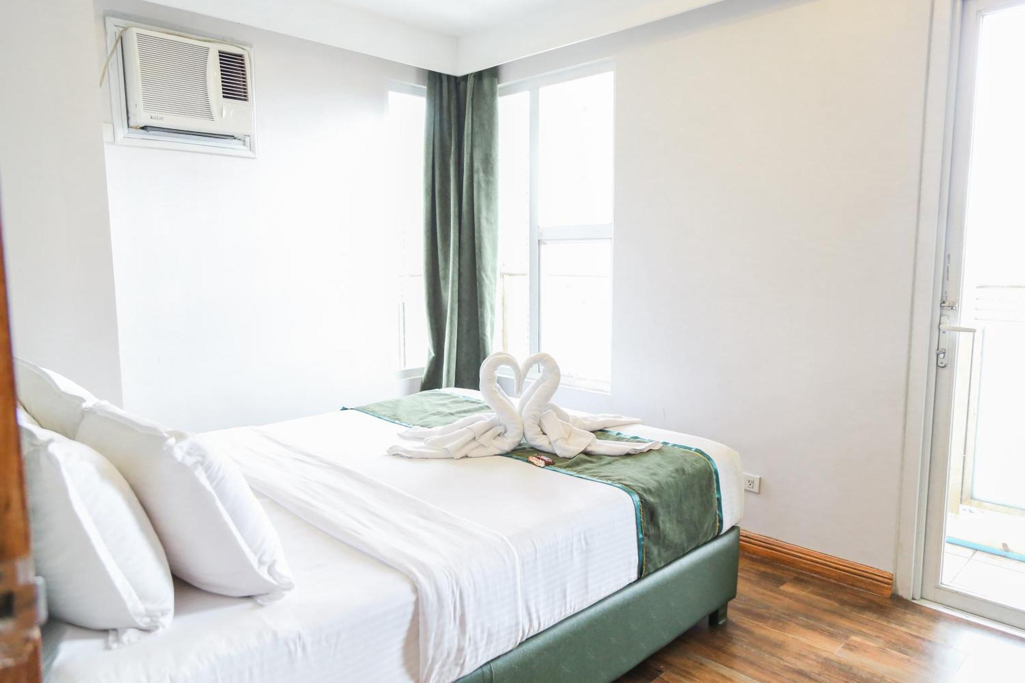 Pacific Bay Grand Suites Manila Exteriör bild